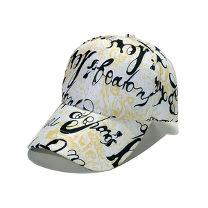 Detail of artistic graffiti lettering and contrast stitching on white baseball cap