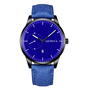 Close-up of minimalist blue dial and matte leather strap of a men's quartz watch