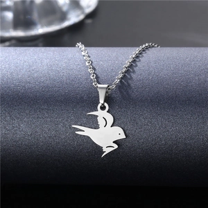 Minimalist silver swallow pendant necklace in stainless steel with a delicate chain