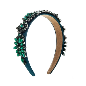 Baroque padded headband with emerald crystals and vintage floral jewel patterns