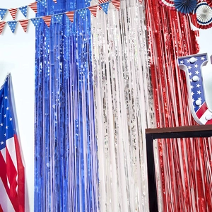 Detail of red white and blue metallic foil fringe curtains for party background decor