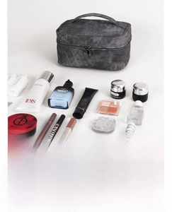 Spacious gray travel toiletry bag showing large capacity for iPad, phone, and cosmetics