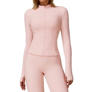 Slim-fit light pink zip-up yoga jacket and leggings set with functional thumbholes