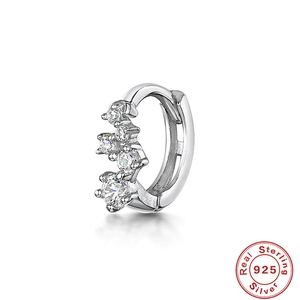 Detail of S925 sterling silver hoop earring with cubic zirconia and certification seal