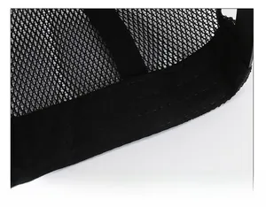Detailed macro view of the wide sweatband and fine stitching on a breathable mesh cap