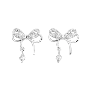 Élégantes boucles d'oreilles nœuds doublés en argent avec diamants et pierres rondes