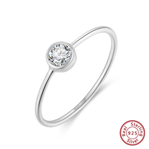 Macro shot of S925 sterling silver stamp on the inner band of the minimalist ring
