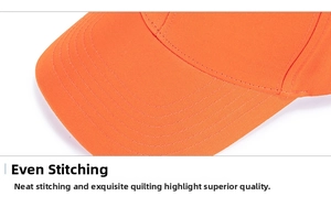 Close-up of high-quality uniform stitching on the brim of an orange cotton baseball cap