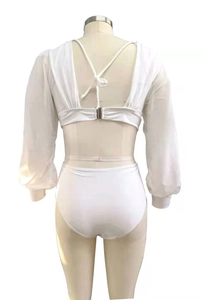 Rear view of white bikini with long puff sleeves and tie-back closure on a mannequin