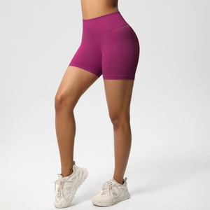 Close-up of fuchsia seamless high-waisted shorts with compression for butt lift