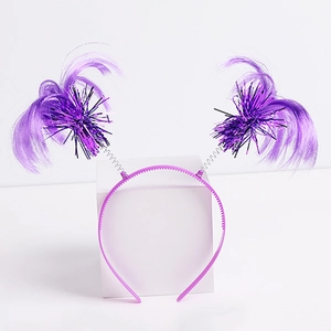 Detail of purple party headband with festive feathers and metallic spring on white stand