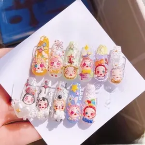 Macro view of 3D embossed colorful nail art stickers with cute cartoon and stars