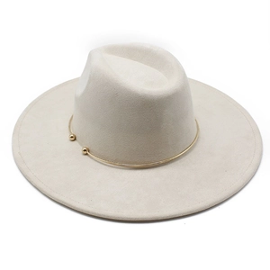 Detail of light beige fedora with wide brim and elegant gold metal ring trim detail