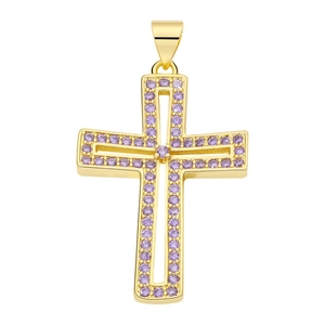 Macro shot of gold cross pendant with sparkling purple zircon inlay for necklaces