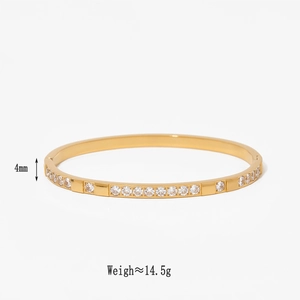 Detail showing 4mm width and 14.5g weight of gold stainless steel heart zircon bracelet