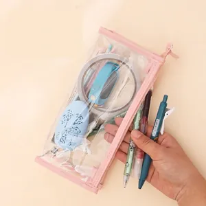 Transparent PVC pencil case with pink trim and zipper showing large capacity storage