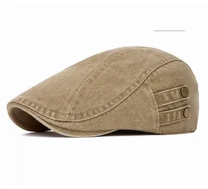 Side view of vintage khaki flat cap featuring washed cotton and retro bronze metal buttons