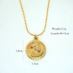 Detailed view of 14k gold plated sun and moon pendant with colorful crystals and dimensions