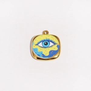 Detailed view of square gold evil eye pendant with vibrant yellow and blue enamel art