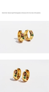 Detailed view of gold hoop earrings featuring colorful star-shaped zircon stones