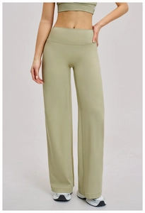 Detailed view of high-waisted wide-leg athletic pants in soft olive green fabric