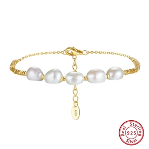 Detail of 925 sterling silver pearl bracelet with Baroque style pearls and S925 hallmark