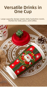 Detail of green Santa Claus ceramic mug with red lid and festive holiday decorations