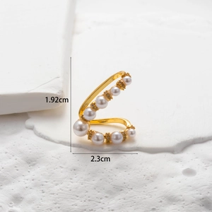 Detailed view of golden butterfly ear clip with pearls and zircons showing size dimensions