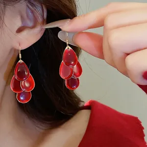 Three-tier red teardrop tassel earrings with elegant gold-plated metal ear hooks