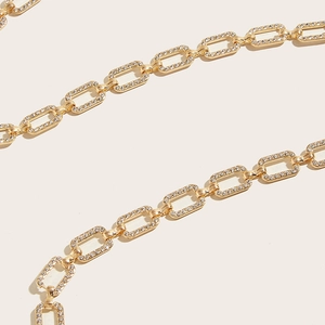 Elegant gold rhinestone waist chain belt with shimmering crystals for dresses and skirts