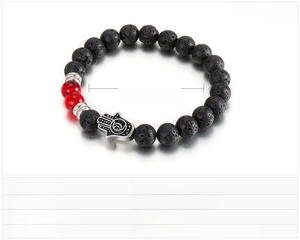 Lava stone bead bracelet with Hamsa Hand pendant showing 72mm inner diameter and 18g weight