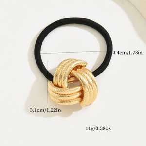 Minimalist black elastic hair tie with a textured gold knot, 4.4cm diameter and 11g weight