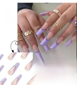 Detail view of long coffin press-on nails with purple French tips and nude base
