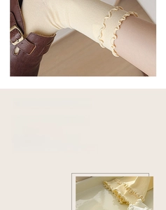 Close-up of cream cotton crew socks with vintage wood ear ruffled edges in a retro style