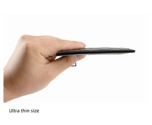 Side view showing the ultra thin size of black checkered pattern leather card holder