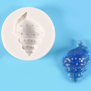 Conch shaped silicone mold for DIY baking and resin crafts with star glitter finish