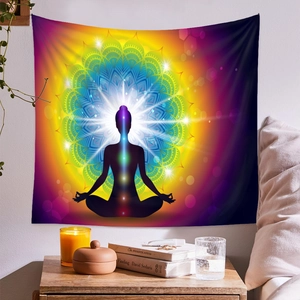 Detailed macro view of vibrant mandala yoga tapestry with colorful chakra points on wall
