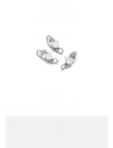 Detail of 7x13mm 18K gold-plated copper lobster clasp with intricate floral engraving