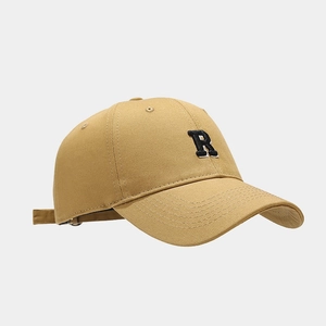 Detailed side view of khaki baseball cap with R embroidery and adjustable metal buckle