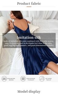 Detailed view of dark blue imitation silk nightgown fabric with five satin weave texture
