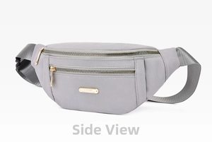 Detailed view of grey nylon waist bag with golden zippers and metal logo plate