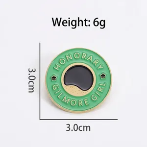 Broche ronde en émail vert avec bordure dorée et motif d'étoile pour accessoires de mode