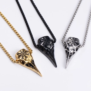 Nordic Viking crow skull necklace with Vegvisir runes in gold, black, and silver finishes