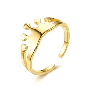 Detailed view of the gold crown-shaped open ring made of polished titanium steel