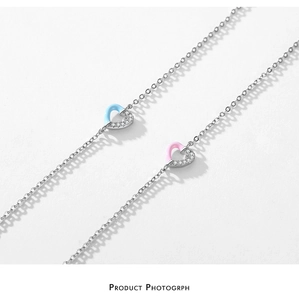 Macro shot of S925 sterling silver bracelets with micro-set heart enamel charms