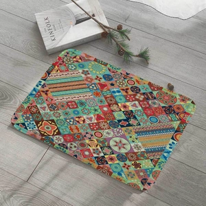 Detail view of rectangular flannel mat with bohemian pattern on wooden floor