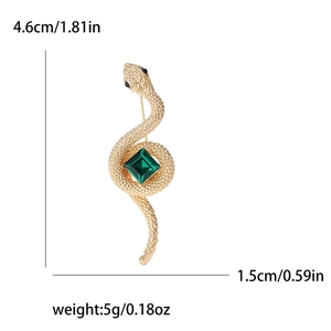 Vintage gold cobra brooch with green gemstone, S-shaped snake design, 4.6cm height