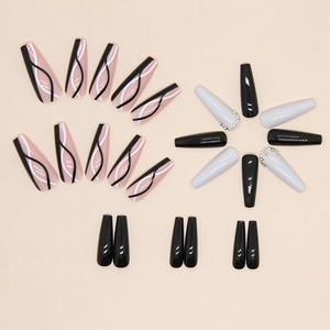 Faux ongles ballerine longs avec motif ondulé noir et blanc et strass étincelants