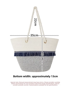 Detail view of woven shoulder bag showing dimensions 35x25cm with blue fringe and cotton rope handle