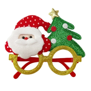 Christmas party glasses with festive Santa Claus and glittery green Christmas tree decor